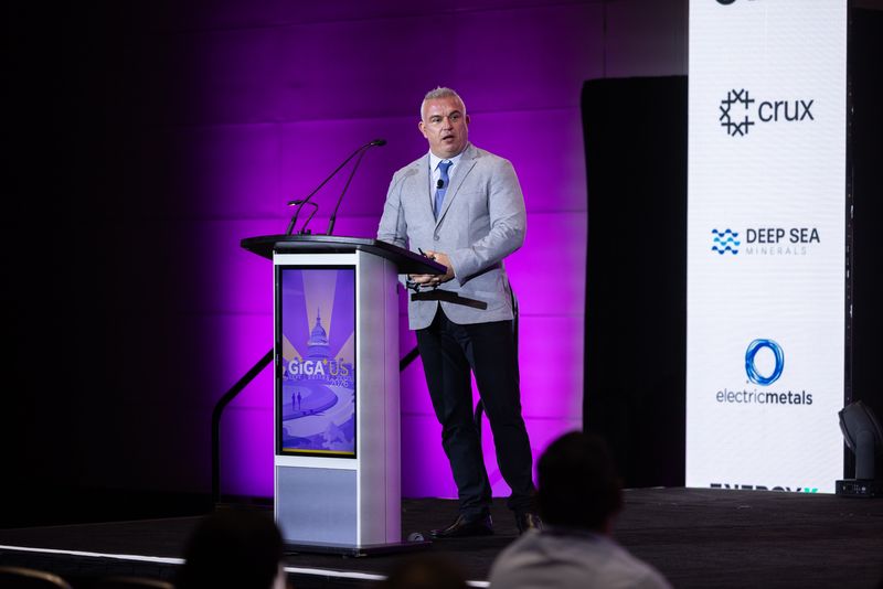 Michael Meding at the lectern at Benchmark Giga US in Washington